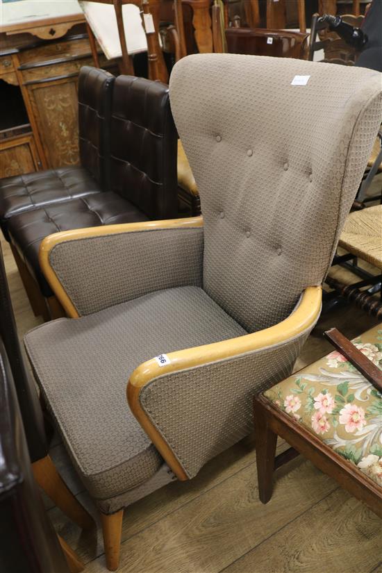 A Howard Keith button back armchair